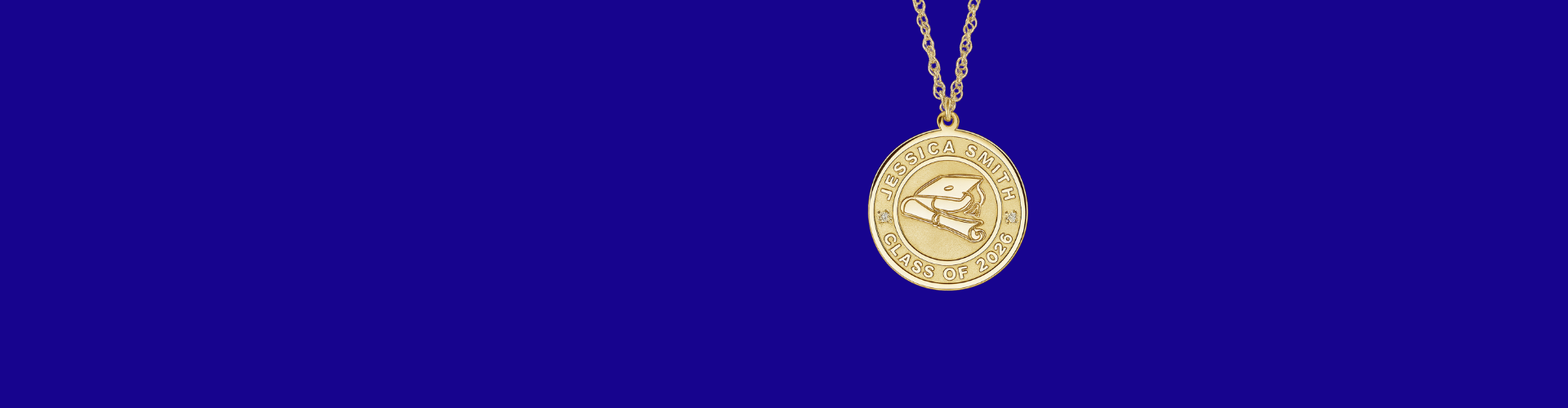 Yellow gold graduation necklace with cap and diploma design, showing Jessica Smith Class of 2026, set with one natural diamond on the left and one on the right.